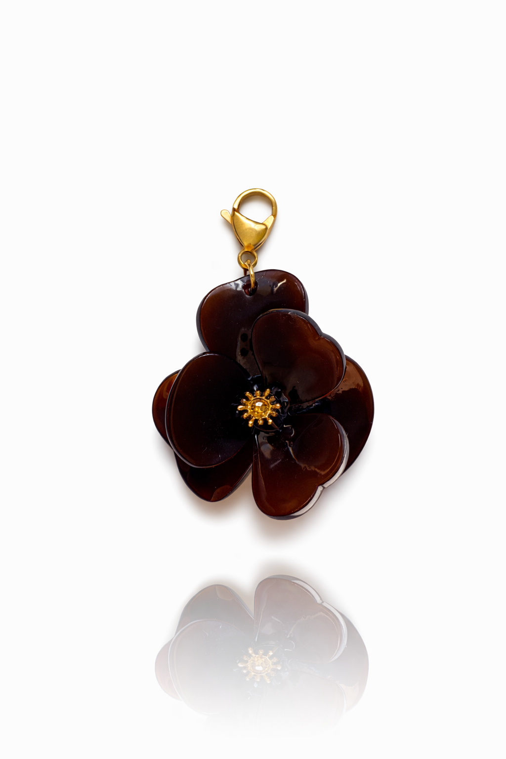 Charm flor marrón