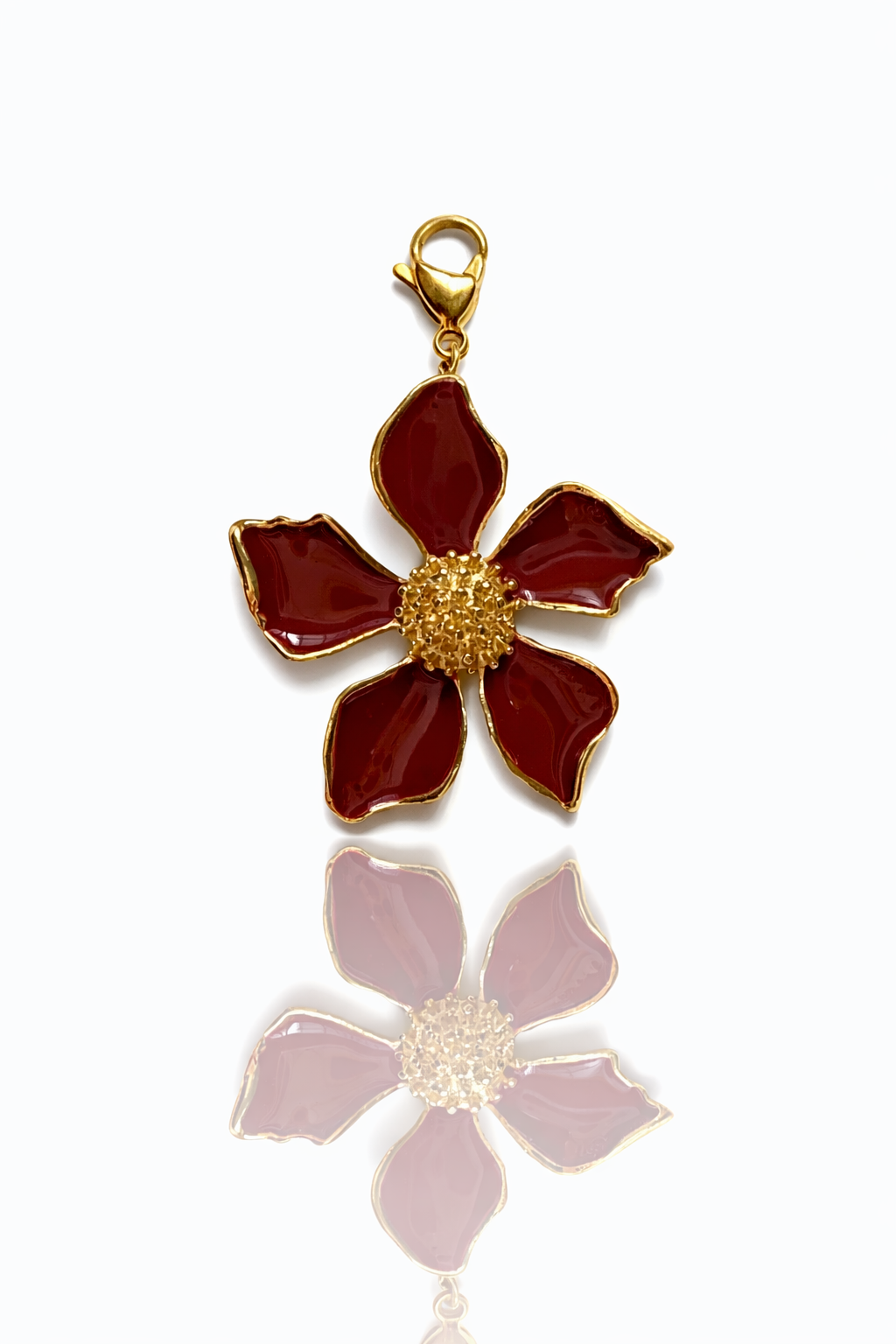 Charm flor marrón