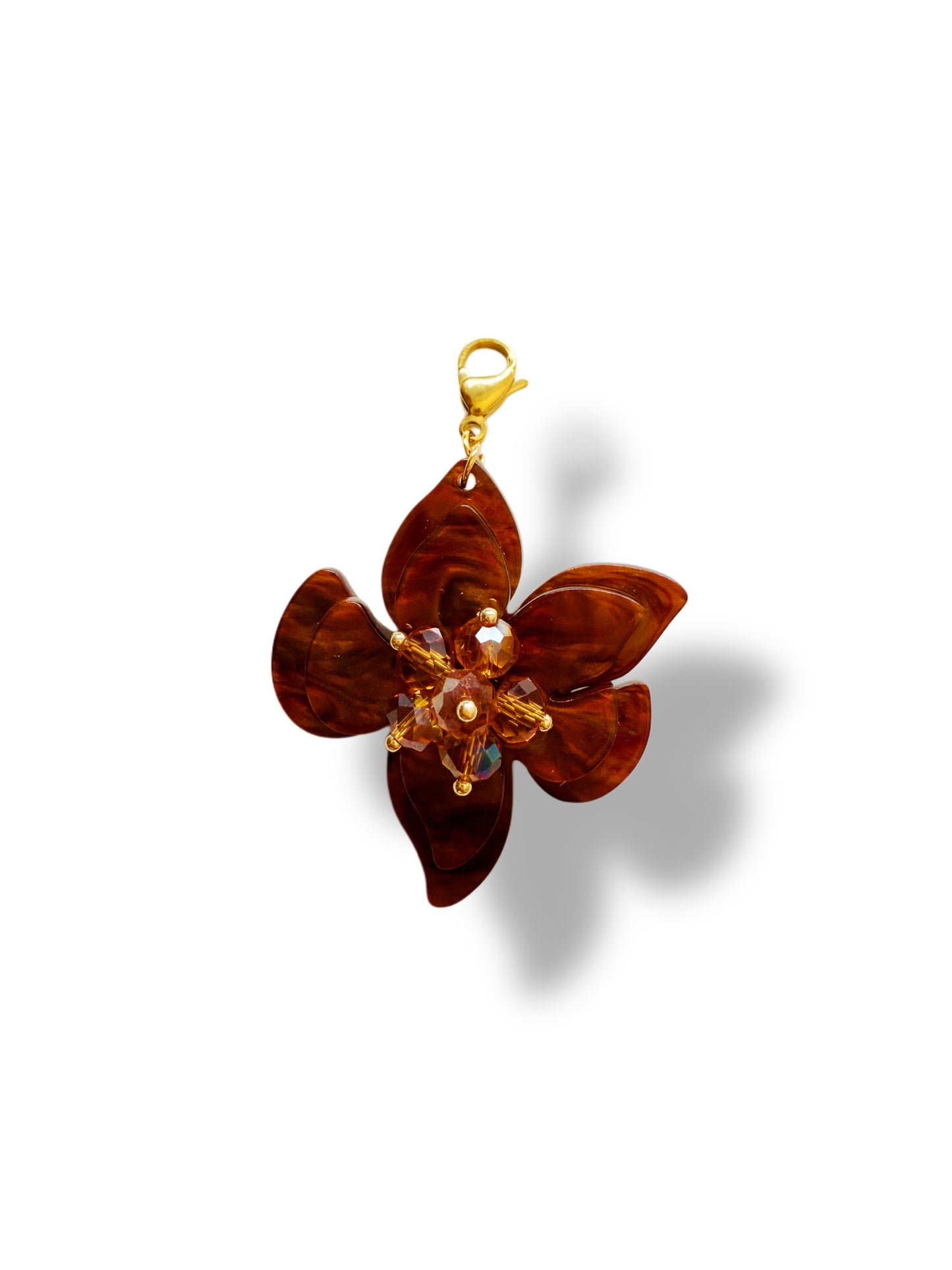 Charm flor marrón