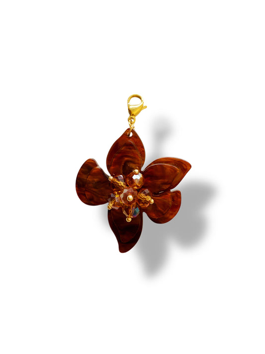 Charm flor marrón